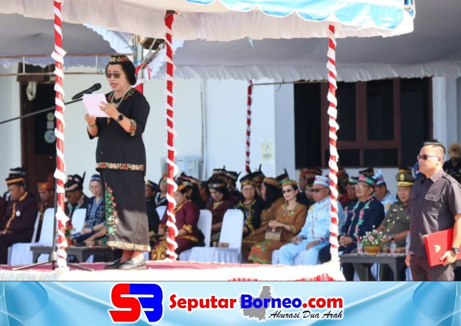 Wabup Gumas, Efrensia LP Umbing membacakan amanat Menteri Pendidikan Dasar dan Menengah RI. (FOTO:ISTIMEWA)